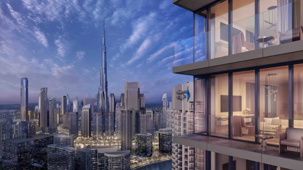 A render of a landscaped pool courtyard flanked by two Emaar residential towers with the Burj Khalifa perfectly framed at the vanishing point. Emaar is one of the developers with a verifiable completed project history that directly mitigates the risks of buying property in Dubai &mdash; their mandatory RERA escrow accounts, milestone-based payment releases, and DLD registration make them a benchmark for lower-risk off-plan investment.